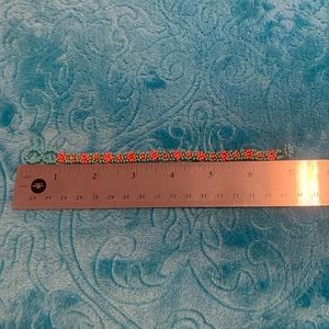 6 1/2 inch coral/blue/gold beaded bracelet